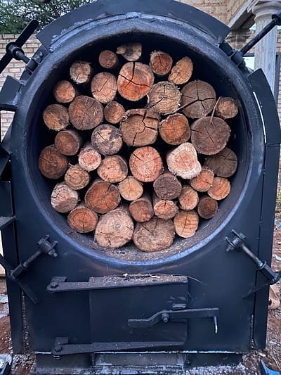 Char kiln loaded with 3 to 4 tons of biomass ready to be closed and start its making char.